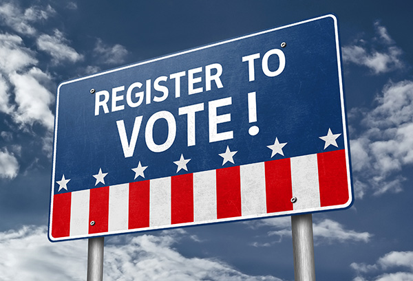Register to Vote red white and blue road sign