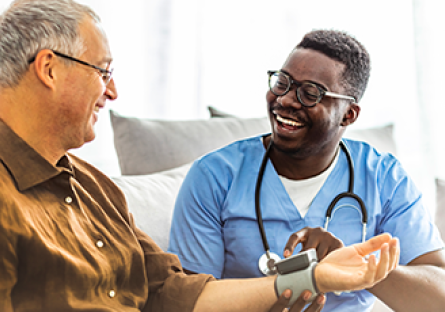 nurse assisting patient