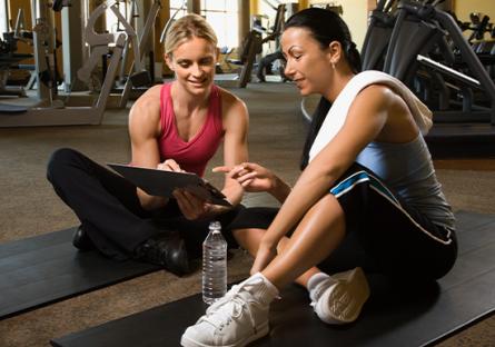 trainer working with fitness expert