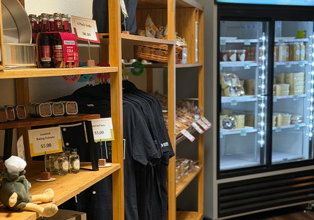 shelves with items and refrigerated unit with food