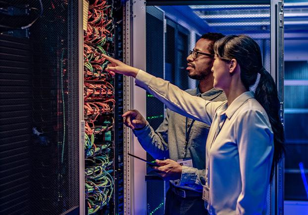 two people working in server room