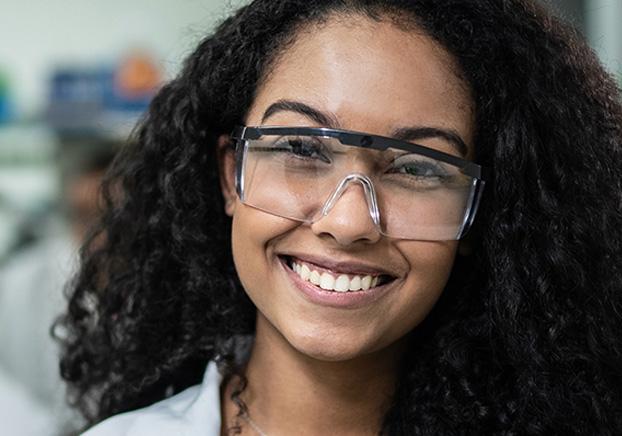 biochemist wearing protective glasses